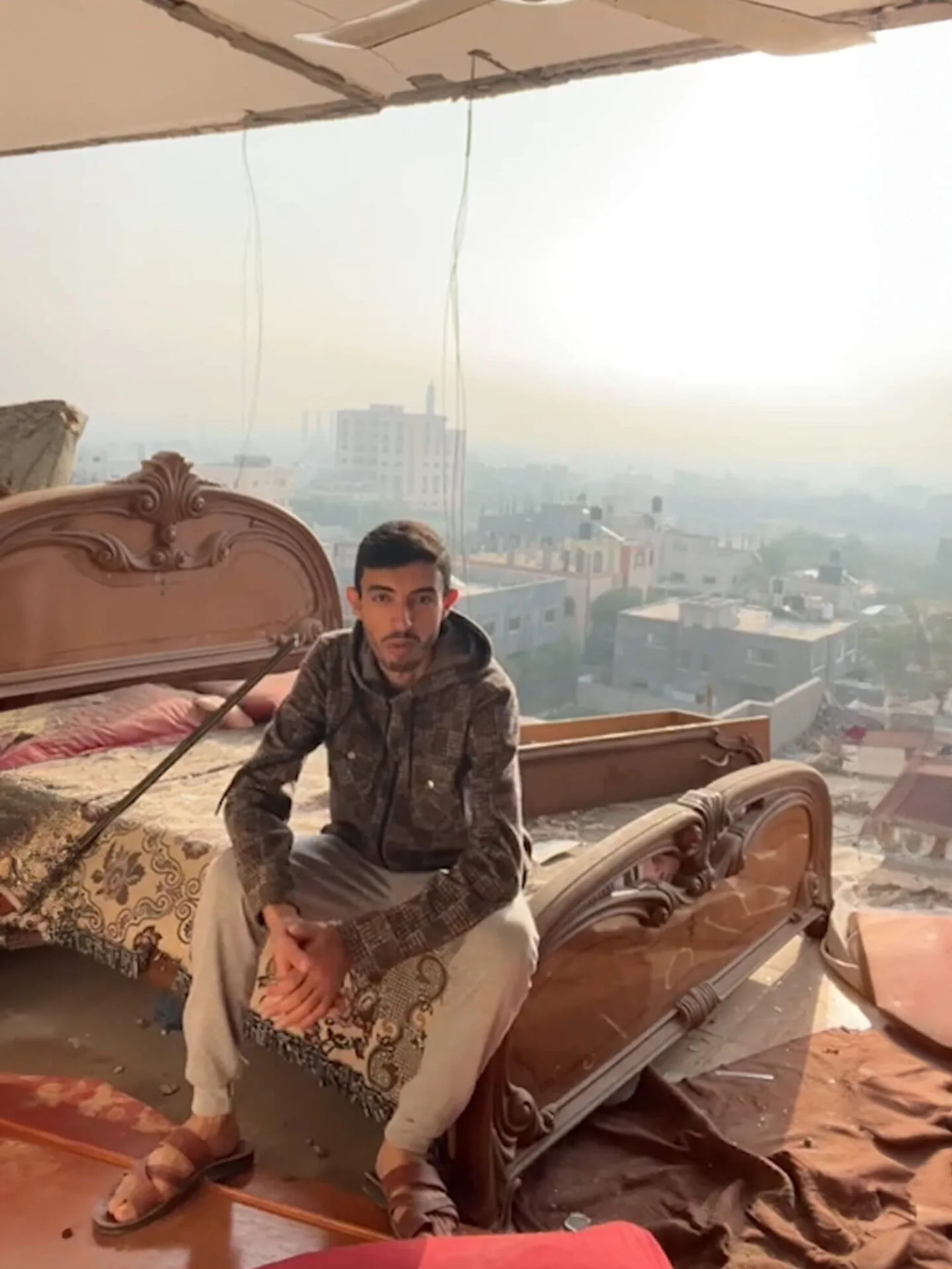 Ahmad in bombed bedroom