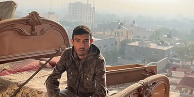 Ahmad in bombed bedroom