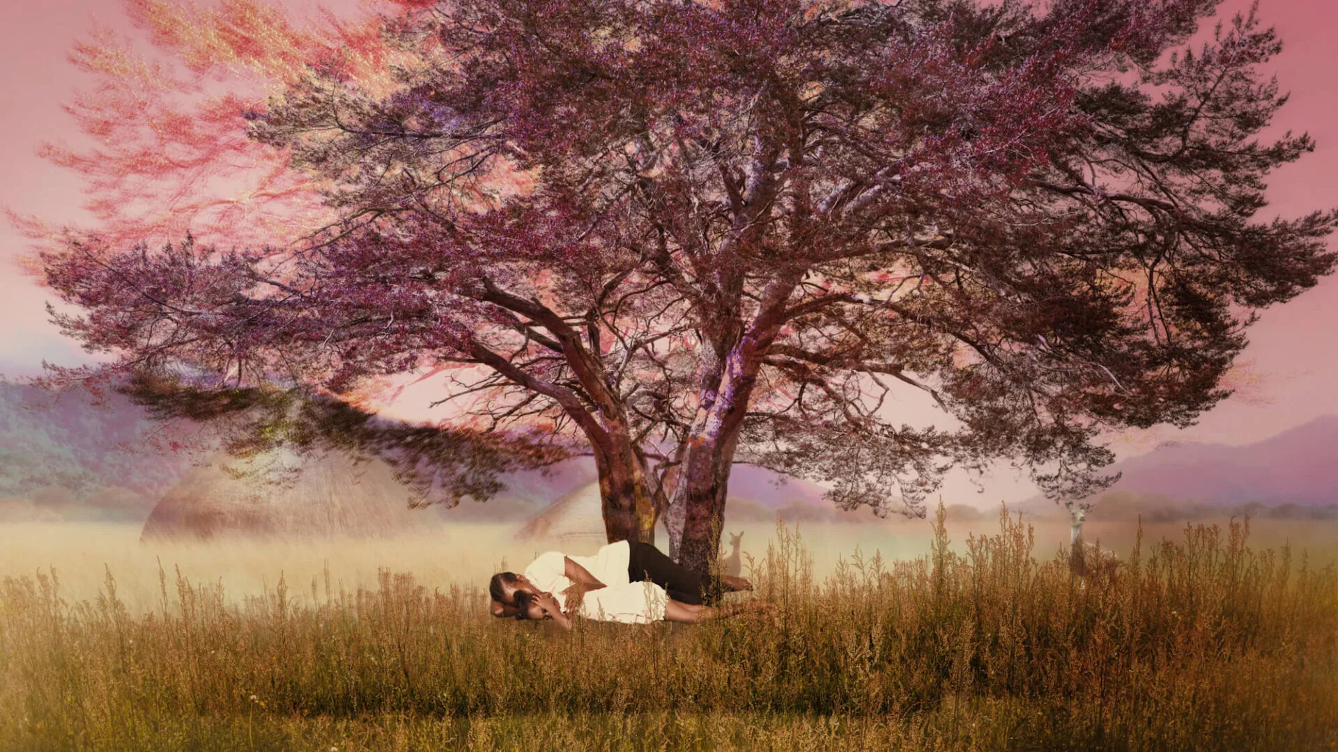 Participant Khadmallah & daughter under a Nubian tree in a dream sequence.